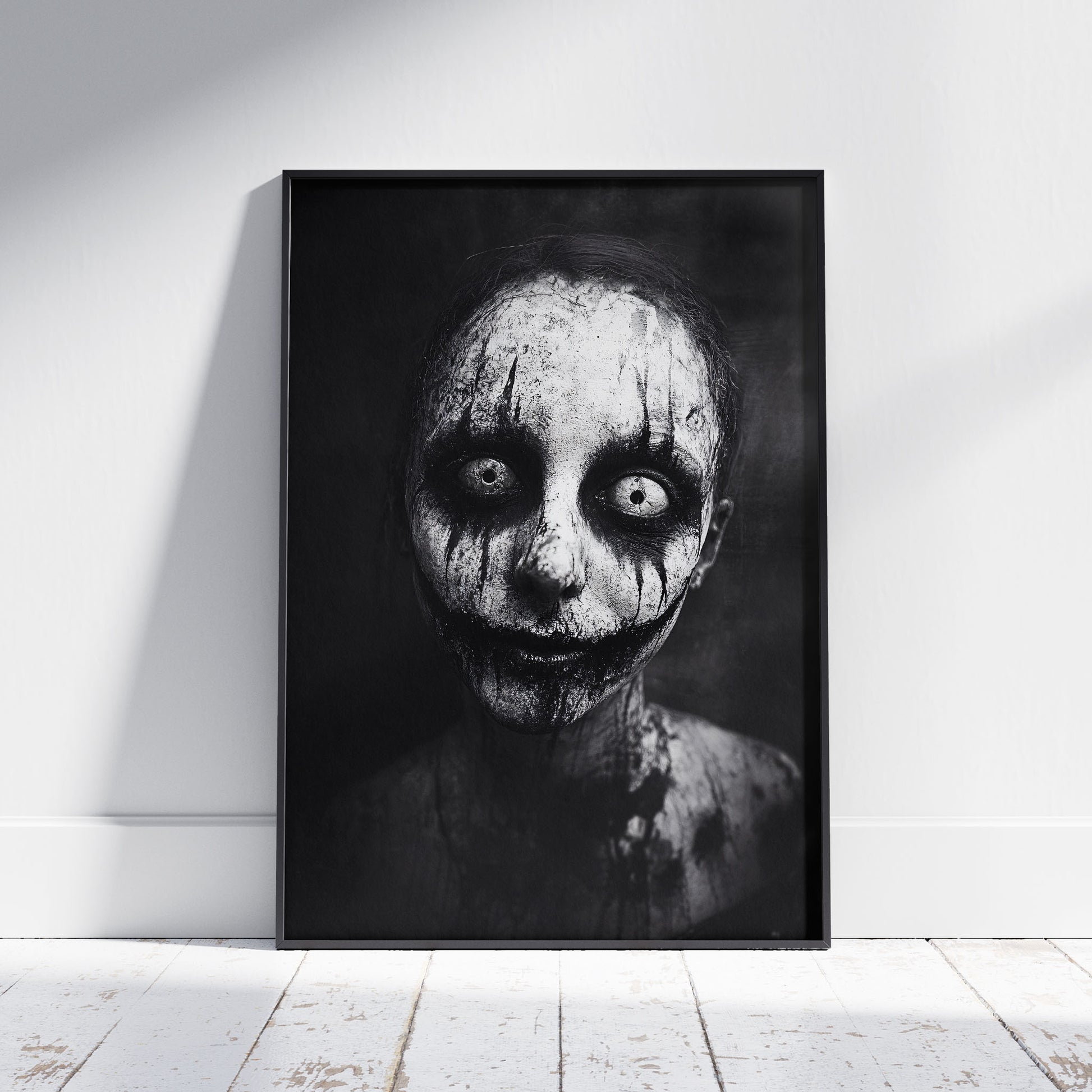 Horror wall art print featuring creepy portrait with hollow eyes in black and white