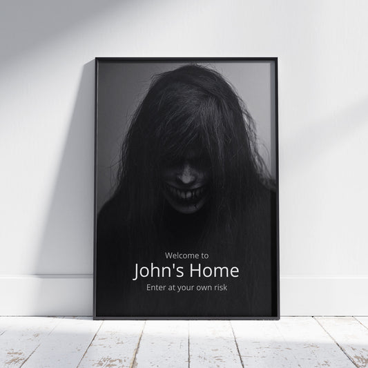 A creepy, dark image of a face with jagged teeth and eyes peering through long black hair. Text overlaid on the image reads: "Welcome to John's Home" and "Enter at your own risk".