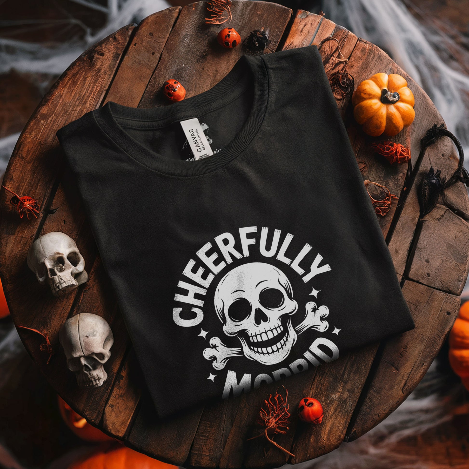 Black gothic tee featuring grinning skeleton skull graphic with sarcastic cheerfully morbid slogan