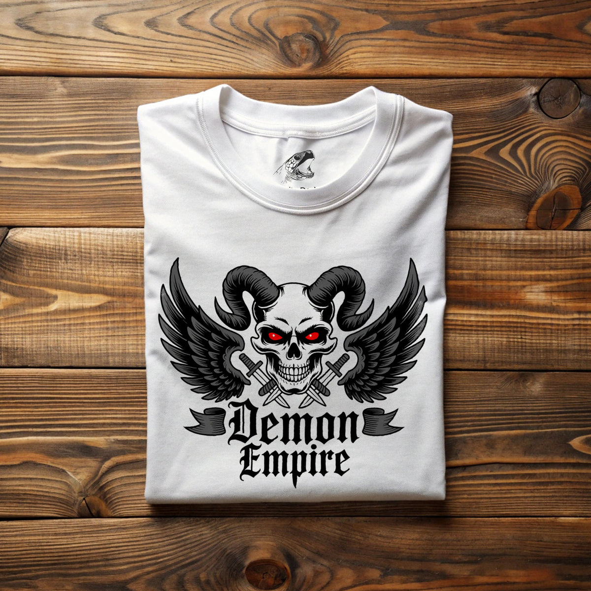 Occult skull print combining ram horns, wings, and dark tattoo-style linework
