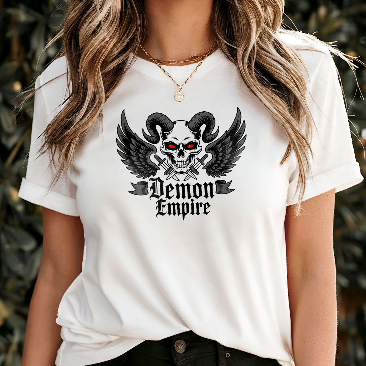 Gothic metal t-shirt graphic of a horned skull framed by spread black wings