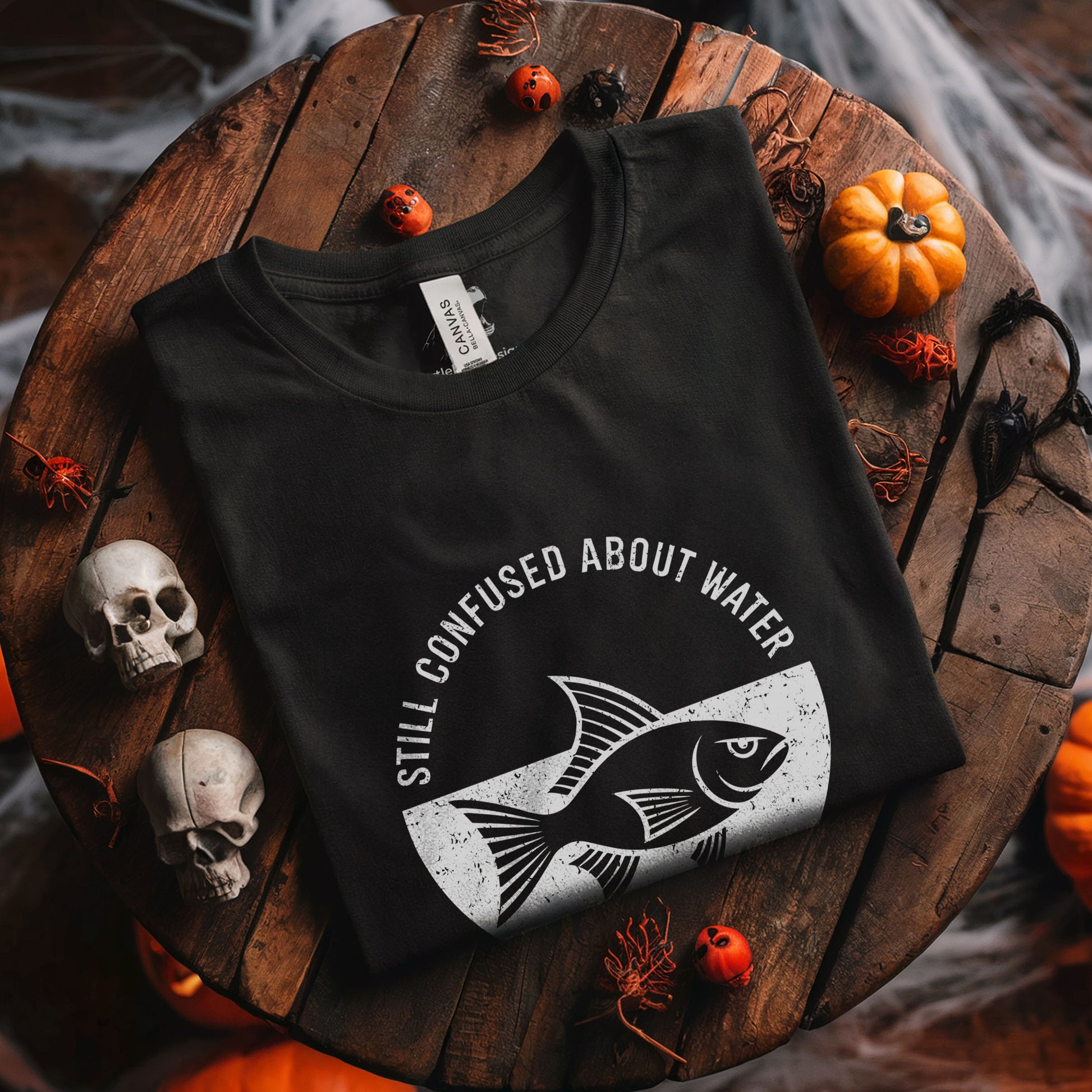 Dark humor graphic tee featuring fish design with sarcastic oxymoron statement about water confusion