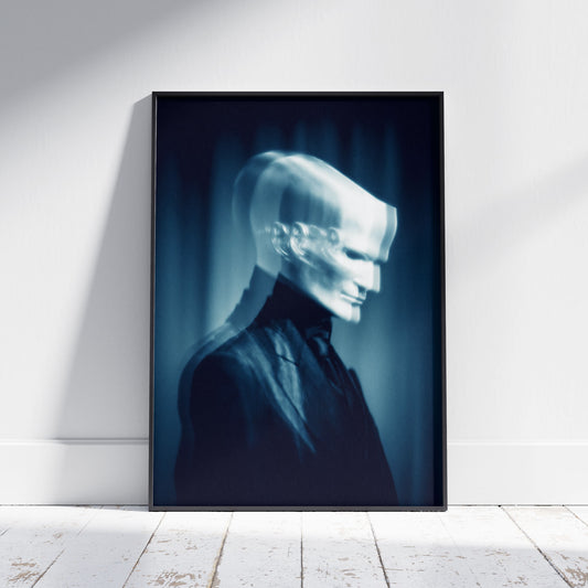 Ghost art print of a blurred luminous figure in a dark suit, blue-toned surreal horror wall art