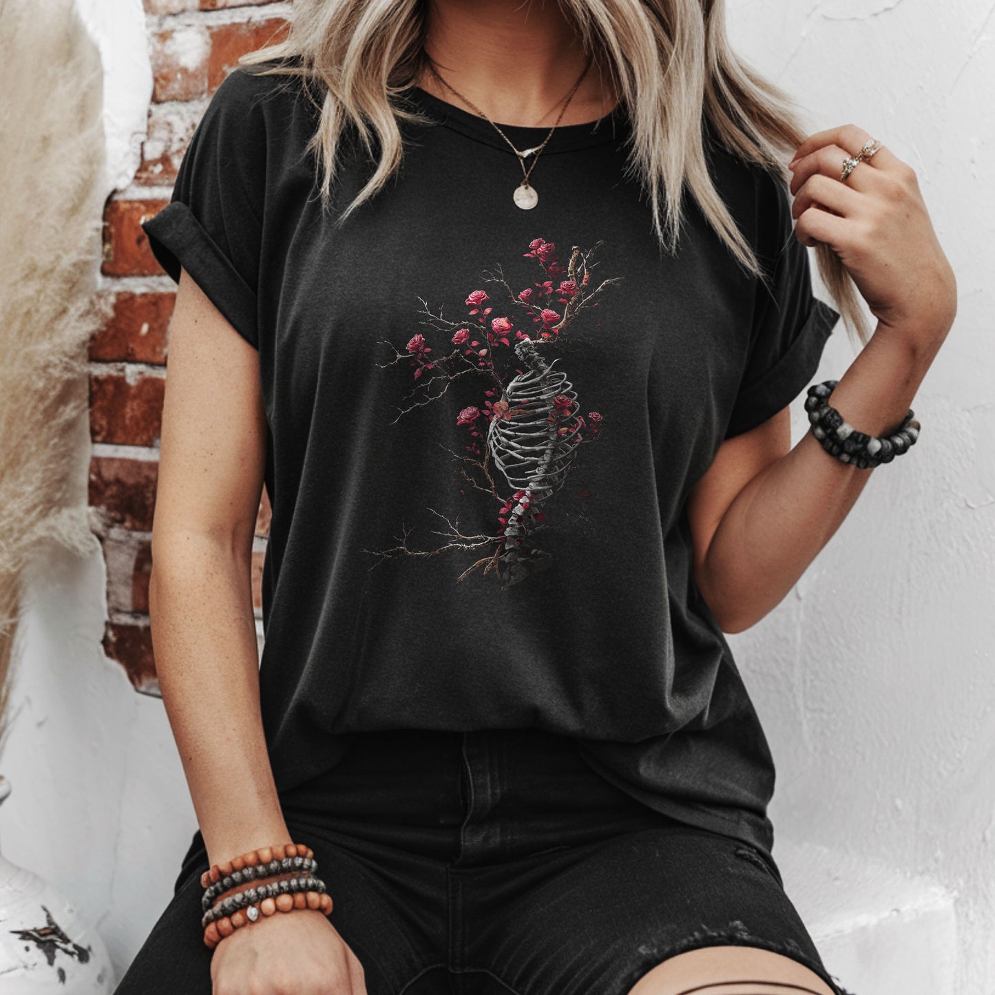 Alternative gothic fashion shirt displaying macabre bone art with romantic rose elements