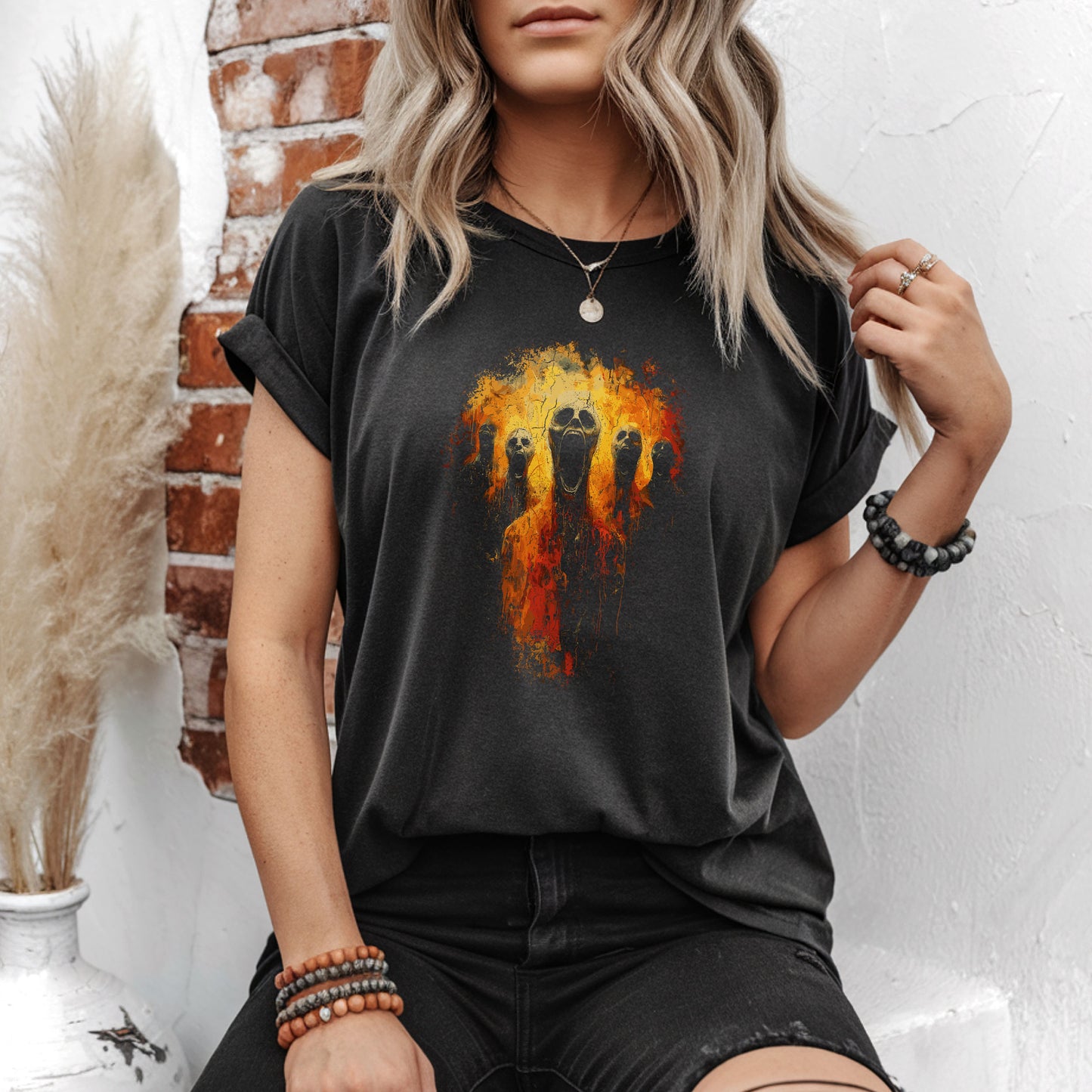 Gothic tee with visceral screaming skulls rising from cracked flame inferno, dark art unisex t-shirt