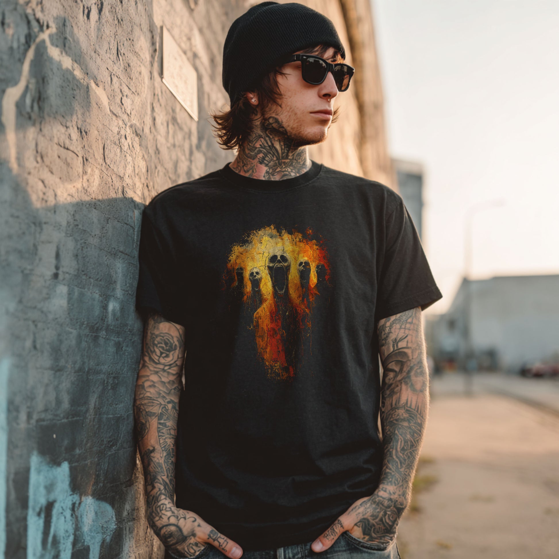 Dark art horror shirt featuring five screaming skull-faced souls engulfed in orange and red hellfire on black background