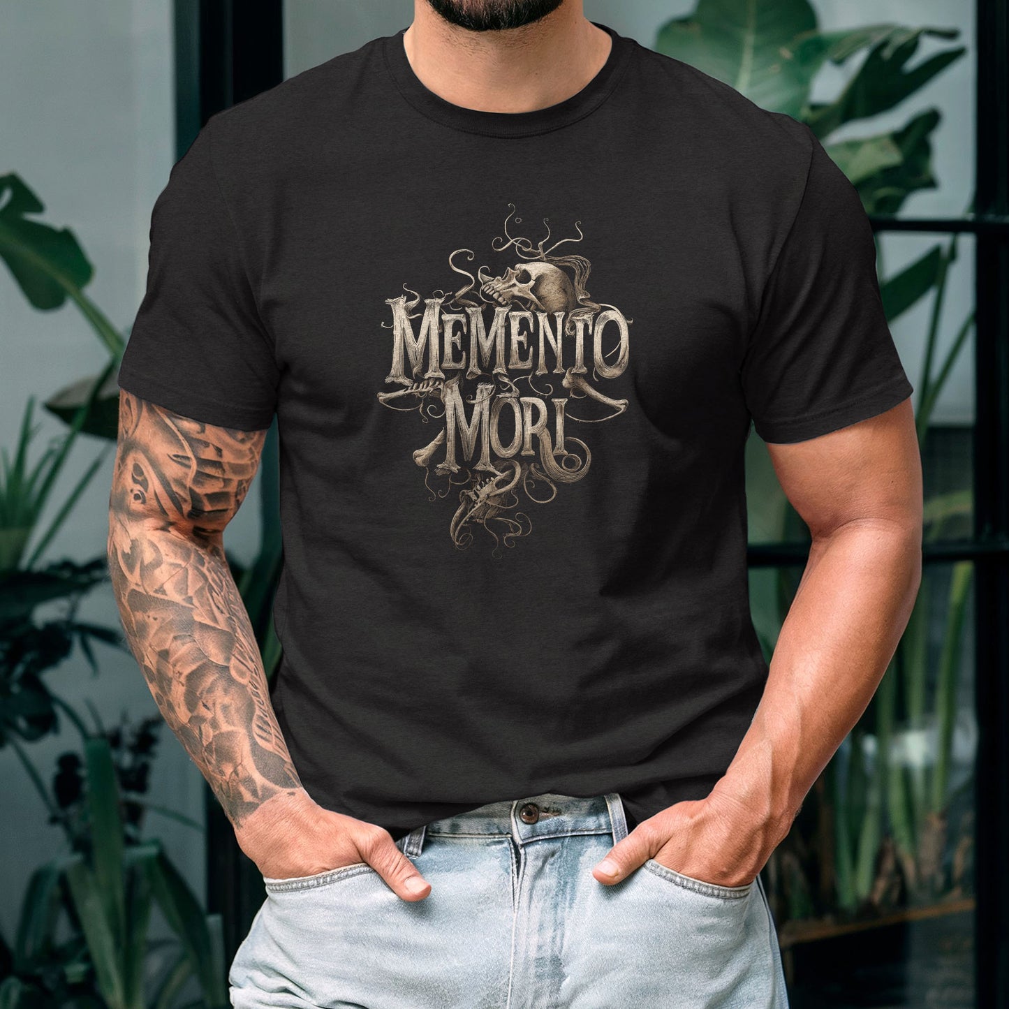Black t-shirt displaying philosophical skull design with ornate flourishes