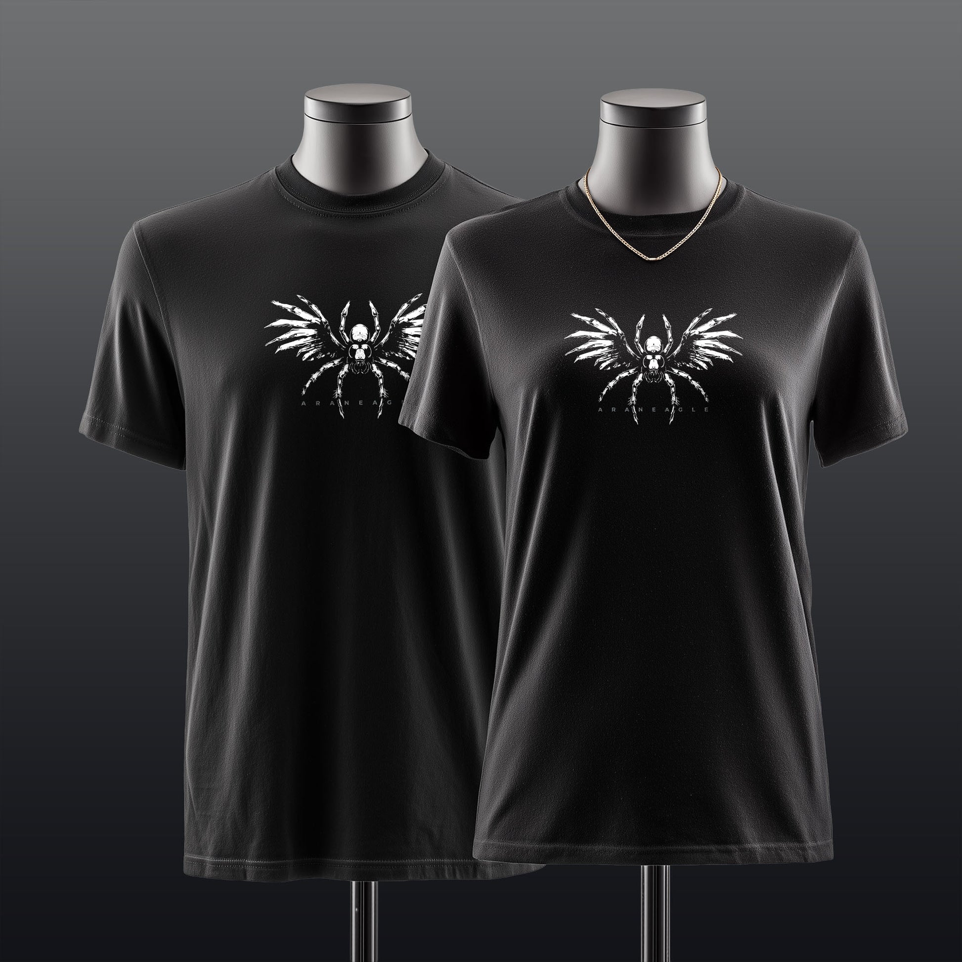 Two black short-sleeve crewneck t-shirts displayed on mannequin torsos against a dark gray gradient background. Both shirts feature a white graphic of a winged spider on the chest.