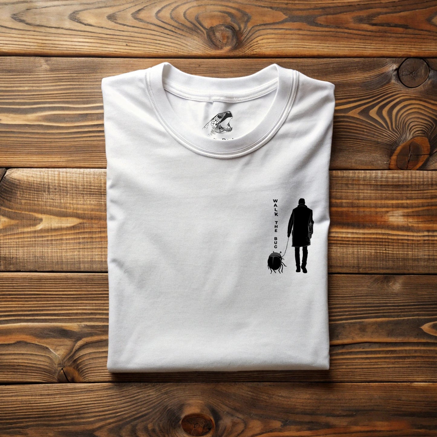 Gothic graphic tee featuring dark surreal beetle-walking illustration